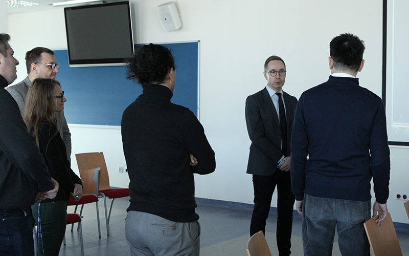 Dr Andrej (centre in suit) with consortium delegates.